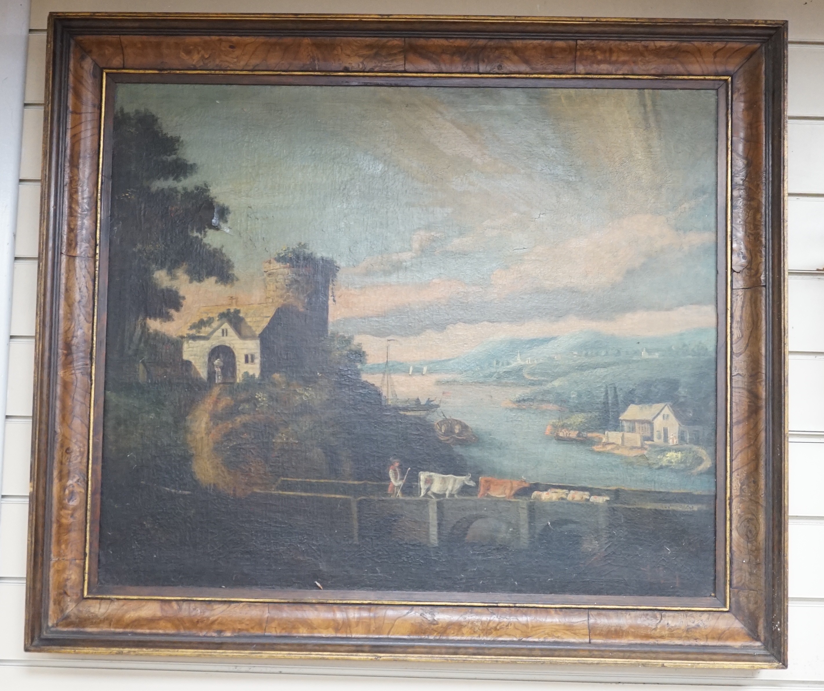 Mid 19th century Continental School, oil on canvas, 'Cattle drover crossing a bridge in a river landscape', 62 x 75cm